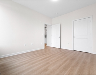 321 E 3rd St - Photo Thumbnail 21