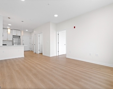 321 E 3rd St - Photo Thumbnail 11
