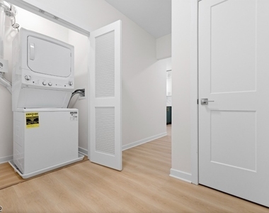 321 E 3rd St - Photo Thumbnail 14