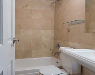 E 13th St. - Photo Thumbnail 6