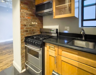 E 13th St. - Photo Thumbnail 1