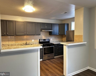 4632 Hillside Road Se - Photo Thumbnail 2