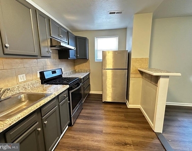 4632 Hillside Road Se - Photo Thumbnail 3