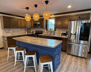15504 Enid Dr - Photo Thumbnail 3