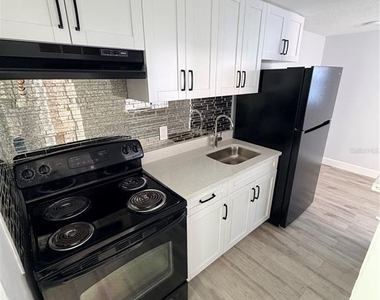 1101 E 140th Avenue - Photo Thumbnail 2