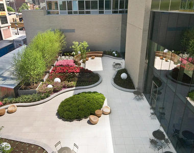 West 37th Street - Photo Thumbnail 14