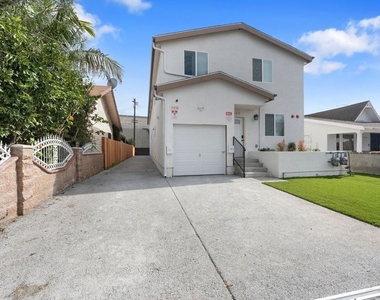 5912 S Flower Street - Photo Thumbnail 1