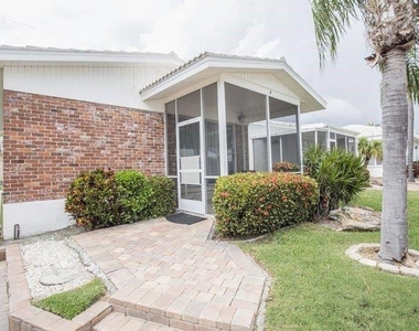 6020 Midnight Pass Road - Photo Thumbnail 4