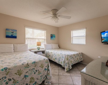 6020 Midnight Pass Road - Photo Thumbnail 11