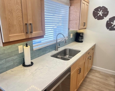 6020 Midnight Pass Road - Photo Thumbnail 8
