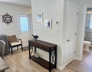 6020 Midnight Pass Road - Photo Thumbnail 4