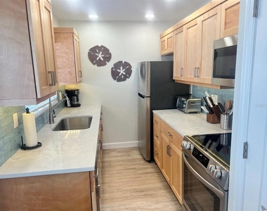 6020 Midnight Pass Road - Photo Thumbnail 2