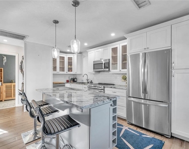 4728 Beach Drive Se - Photo Thumbnail 12