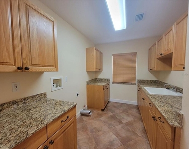 10209 Thurston Groves Boulevard - Photo Thumbnail 40