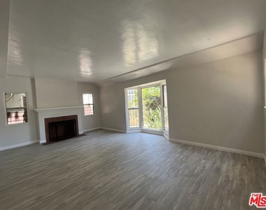 1807 S Redondo Boulevard - Photo Thumbnail 1