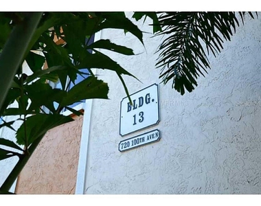 720 100th Avenue N - Photo Thumbnail 2
