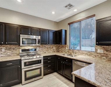 10509 Jeremy Pointe Avenue - Photo Thumbnail 6