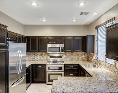 10509 Jeremy Pointe Avenue - Photo Thumbnail 4