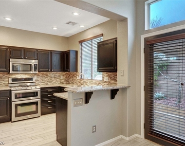 10509 Jeremy Pointe Avenue - Photo Thumbnail 2
