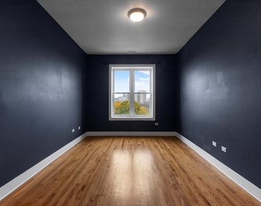 207 E 31st Street - Photo Thumbnail 4