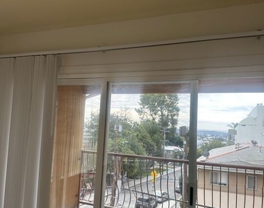 1001 Hammond Street - Photo Thumbnail 3