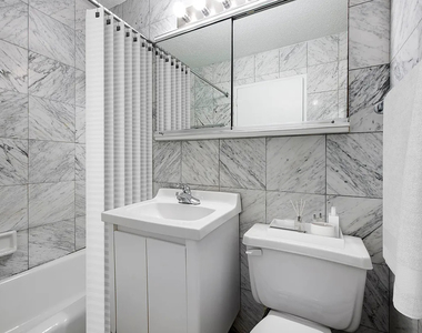 E 52ND ST - Photo Thumbnail 2