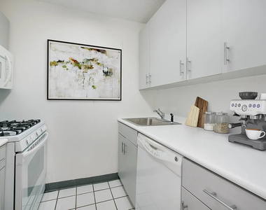 E 52ND ST - Photo Thumbnail 1