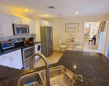 16461 Riverwind Drive - Photo Thumbnail 16