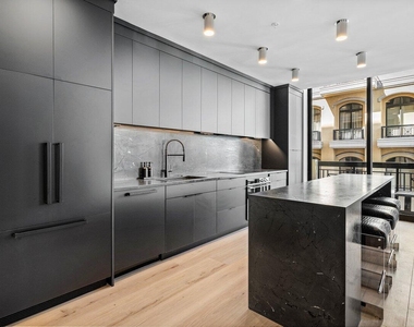 801 S Olive Avenue - Photo Thumbnail 3