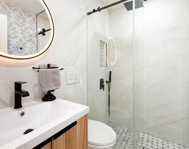 121 Ponquogue Avenue - Photo Thumbnail 14