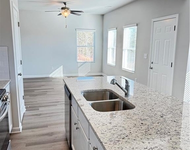 11071 Suria Drive Se - Photo Thumbnail 3