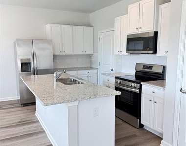 11071 Suria Drive Se - Photo Thumbnail 1