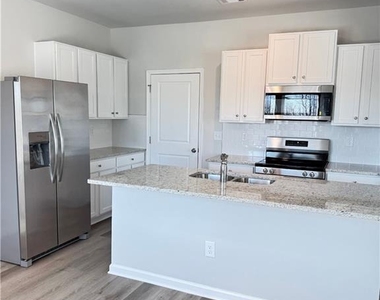 11071 Suria Drive Se - Photo Thumbnail 4