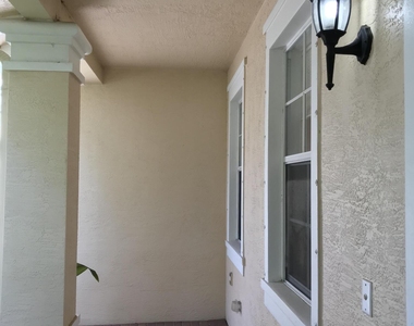 141 E Thatch Palm Circle - Photo Thumbnail 1