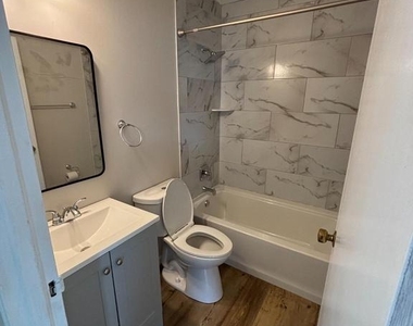 712 W 39th Street - Photo Thumbnail 4
