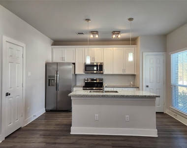 9710 Tuffly Street - Photo Thumbnail 2