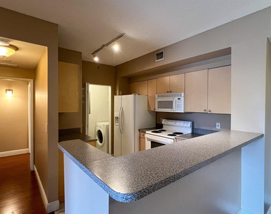 7950 N Nob Hill Road - Photo Thumbnail 5