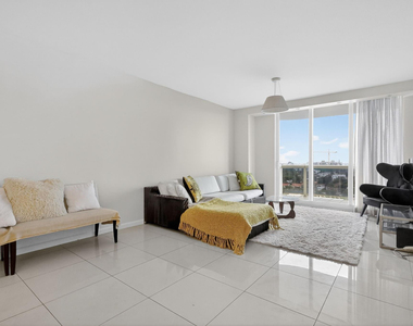 9595 Collins Avenue - Photo Thumbnail 3