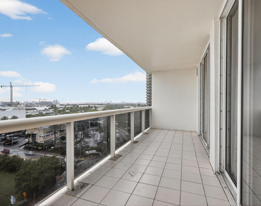 9595 Collins Avenue - Photo Thumbnail 1
