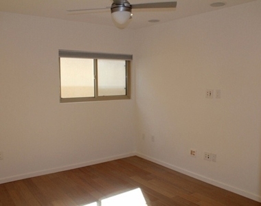 141 S Clark Drive - Photo Thumbnail 4