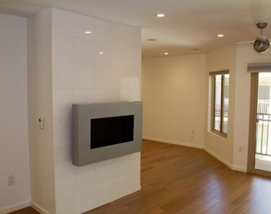 141 S Clark Drive - Photo Thumbnail 2