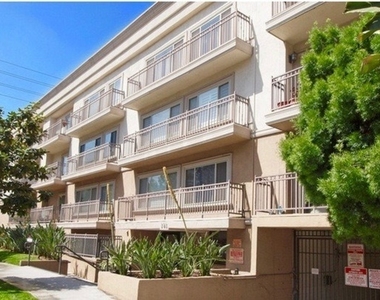 141 S Clark Drive - Photo Thumbnail 8