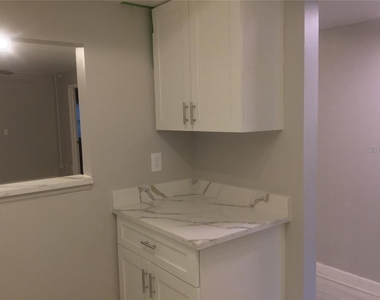 1100 E Bay Drive - Photo Thumbnail 4