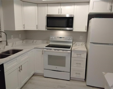 1100 E Bay Drive - Photo Thumbnail 2