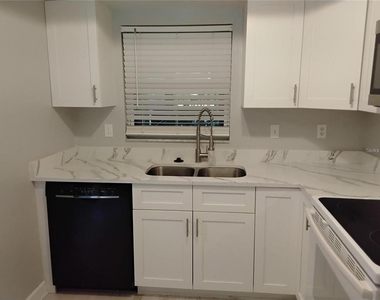 1100 E Bay Drive - Photo Thumbnail 3
