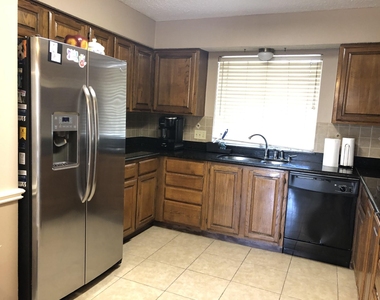 8715 Lawncliff Lane - Photo Thumbnail 2