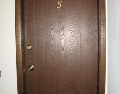 709 W 65th Street - Photo Thumbnail 1