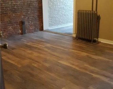 228 W 3rd Street - Photo Thumbnail 2