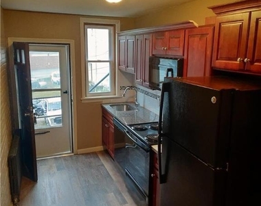 228 W 3rd Street - Photo Thumbnail 1