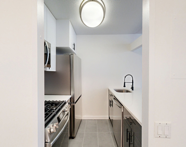 401 E 34th St - Photo Thumbnail 1